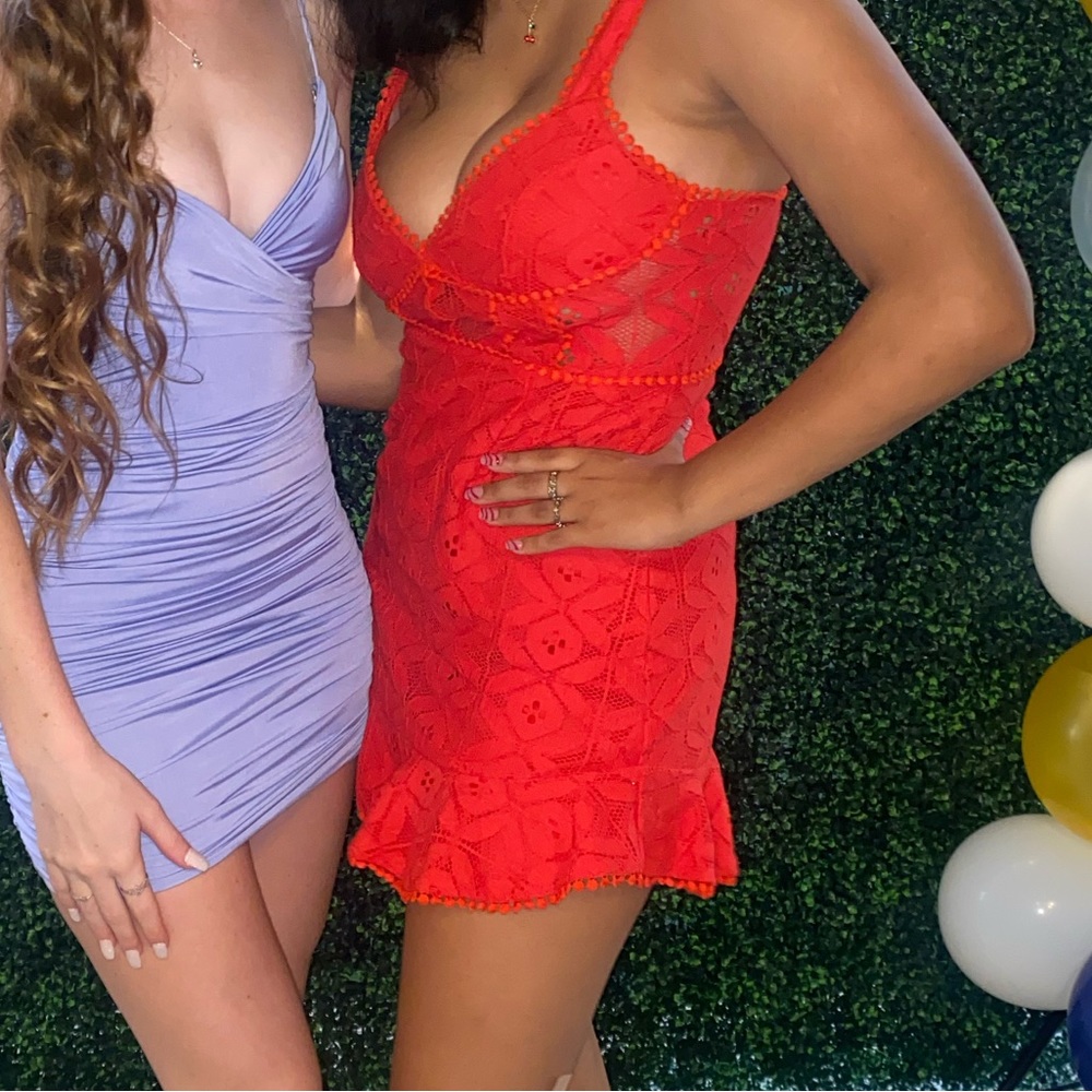 Bodycon red lace mini dress. (Boutique)